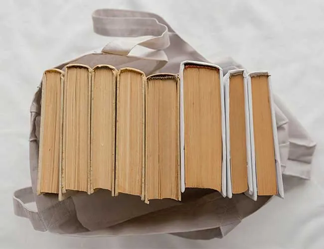 top view books stack bag